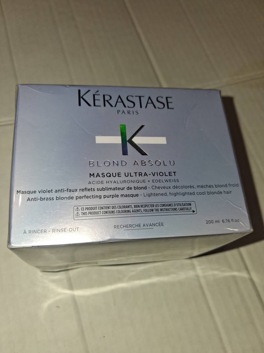 Kérastase Blond Absolu Masque Ultra-Violet, a deep purple hair mask designed to